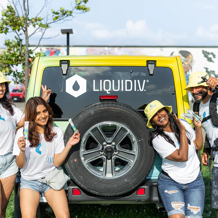 Person using Liquid I.V. hydration drink for improved hydration